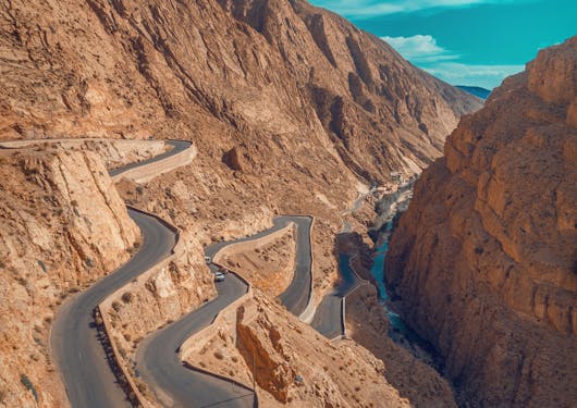 An aerial view of the Dades Gorge in Morocco through dramatic rocks carved by nature over time.