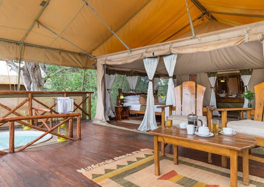A luxurious tented room is shown at an accommodation in Kenya.