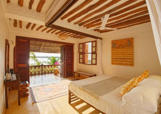 The warm interior of a room at an accommodation in Kenya.