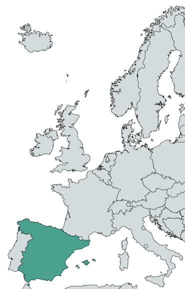 The country of Spain is highlighted in teal on a world map of Europe.