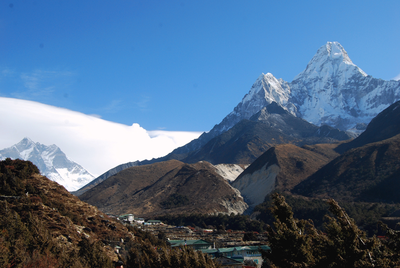 The Amadablam Base Camp trek passes through the town of Pang, with mountains in the background.