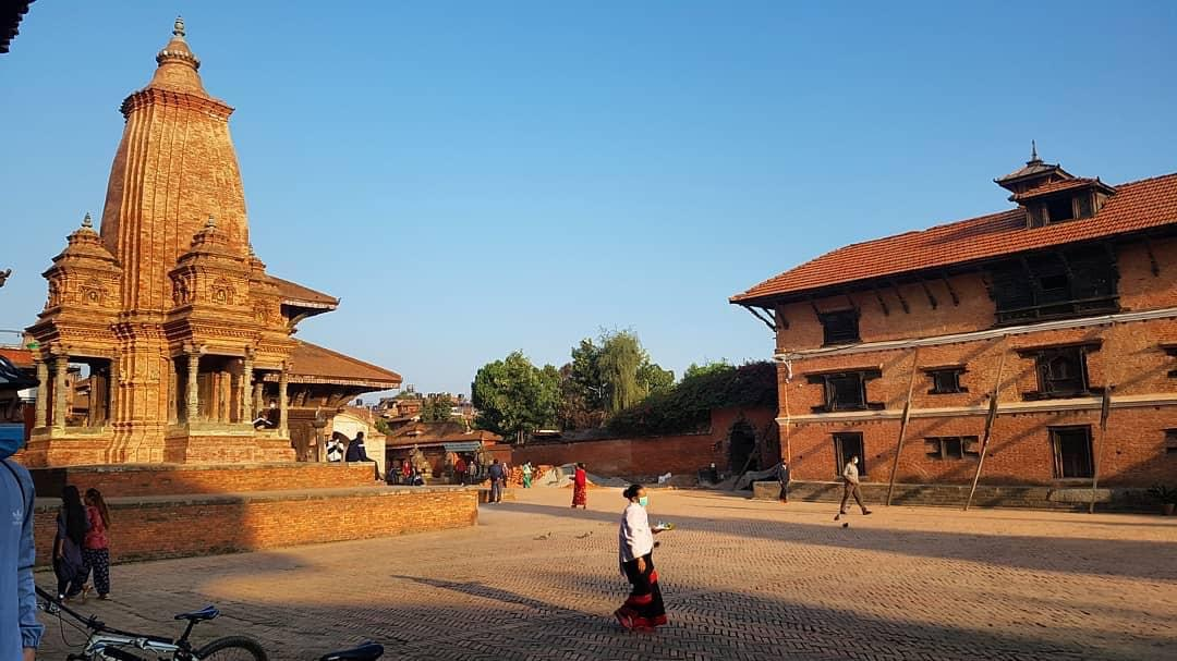 Bhaktapur is shown at golden hour.