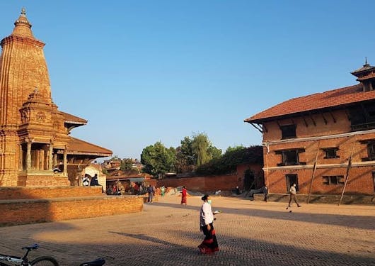 Bhaktapur is shown at golden hour.