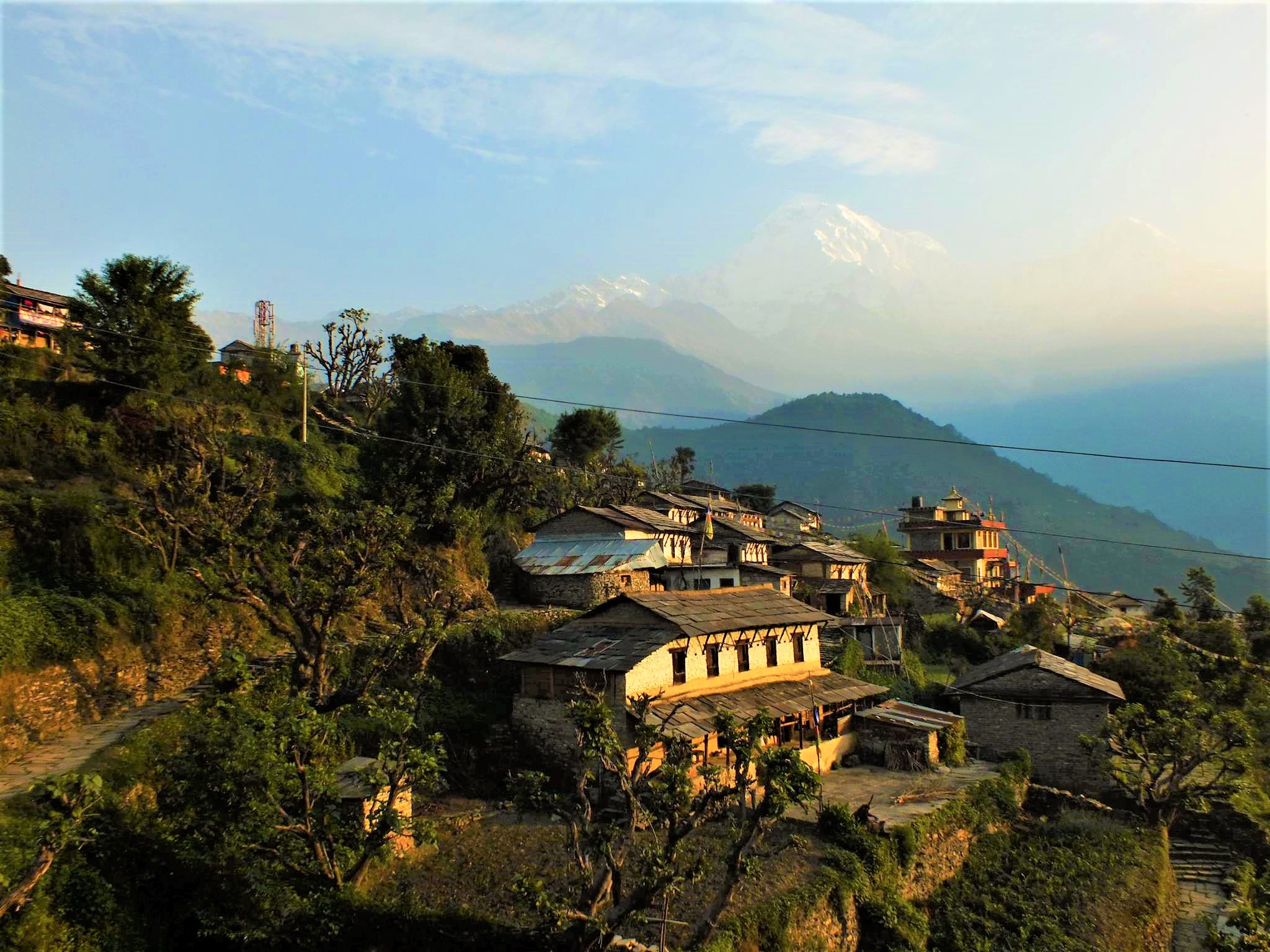 Ghandruk Village is shown at sunset along the Annapurna Panorama Trek in Nepal.