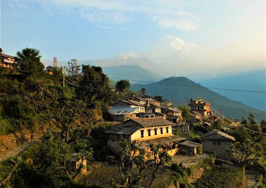 Ghandruk Village is shown at sunset along the Annapurna Panorama Trek in Nepal.
