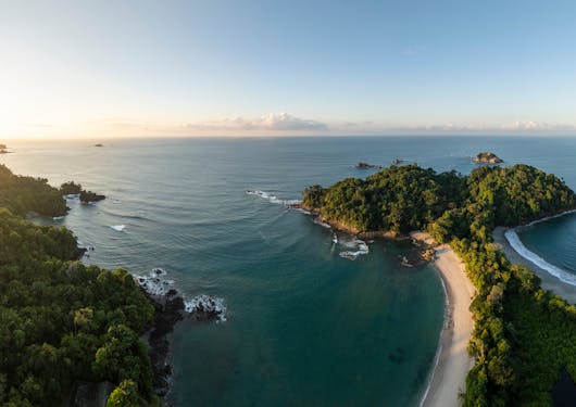 A sunset view of Manual Antonio beach in Costa Rica.