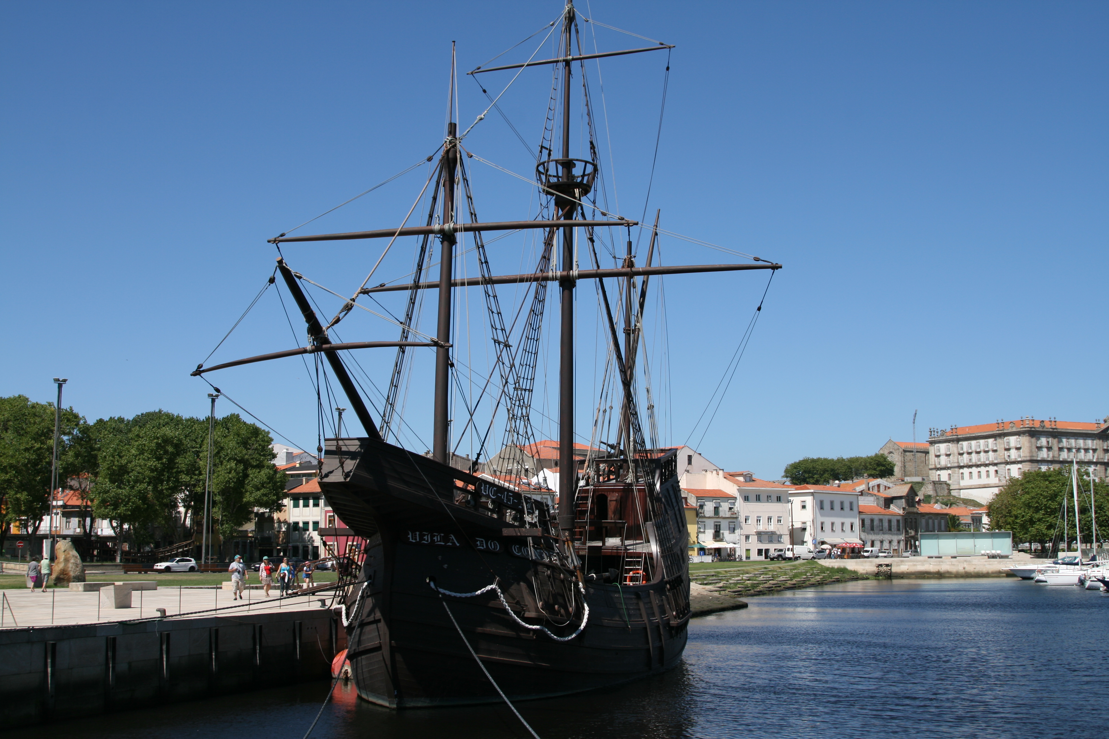 A boat is shown in a harbor along Portugal's Costa Verde.