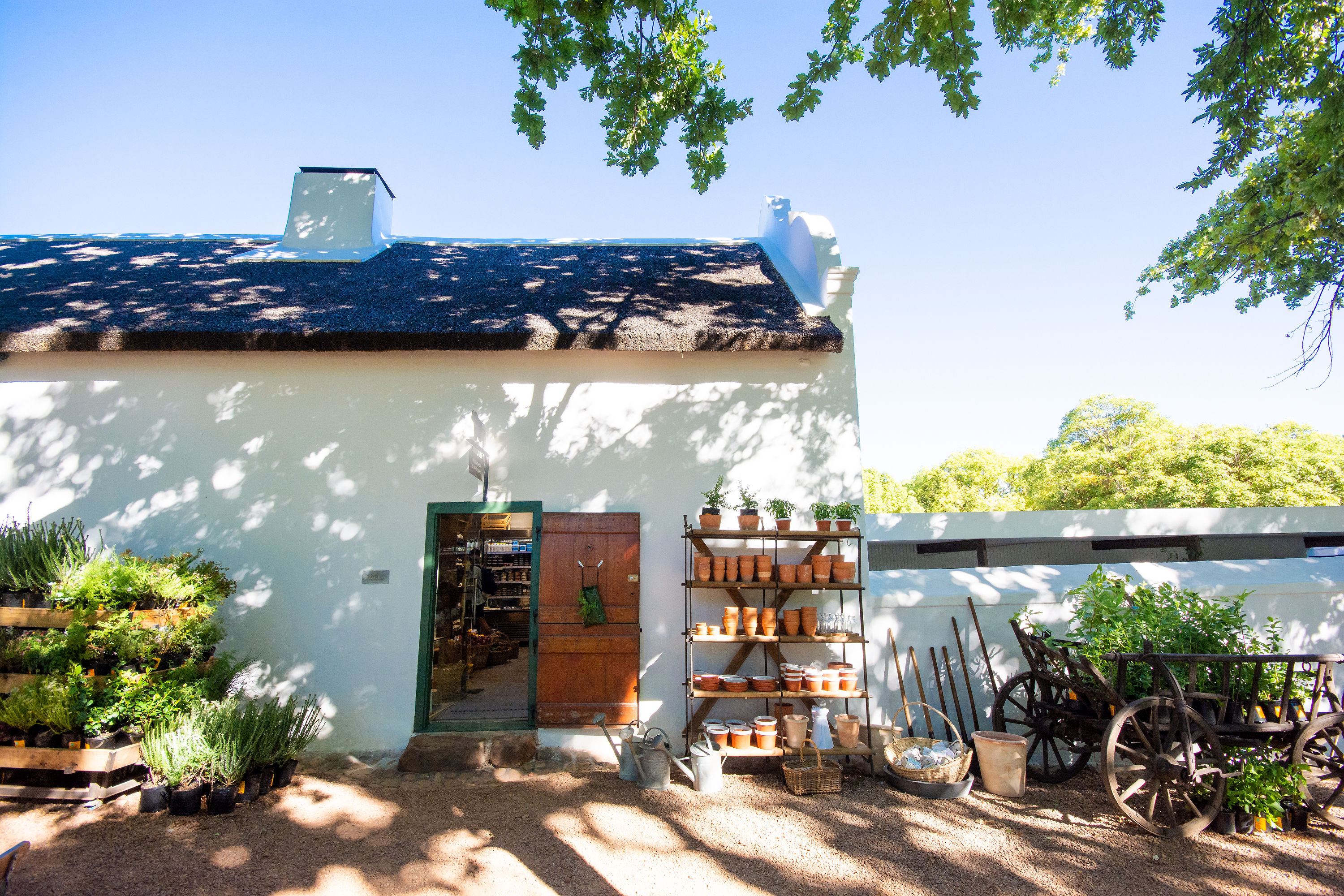 In Boschendal, South Africa, the entrance to a shop is shown.