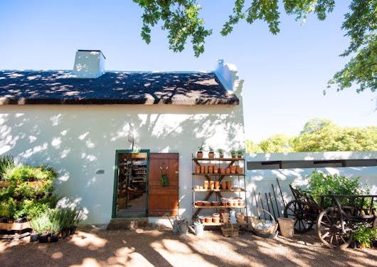 In Boschendal, South Africa, the entrance to a shop is shown.