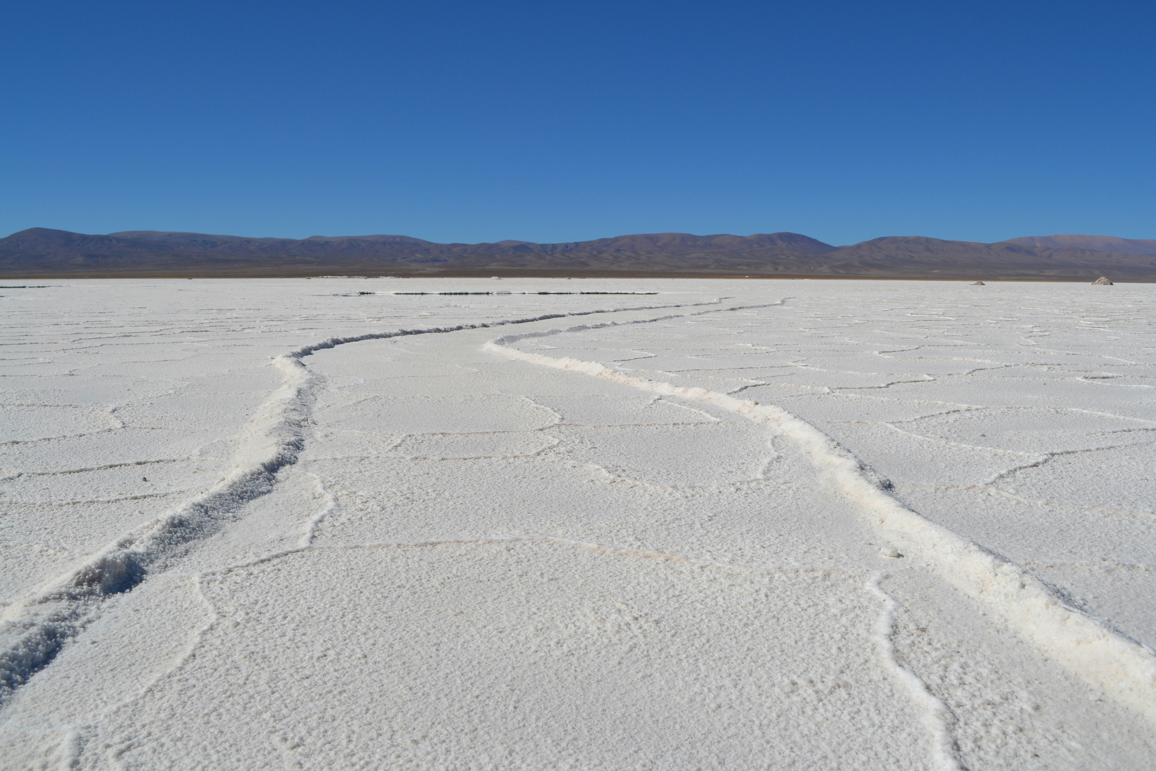 The Salinas Grandes salt flats in Salta Province, Argentina. White sand in shallow focus.