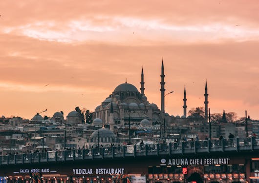 Istanbul's famous mosque, the Hagia Sofia, is shown at sunset from the water.