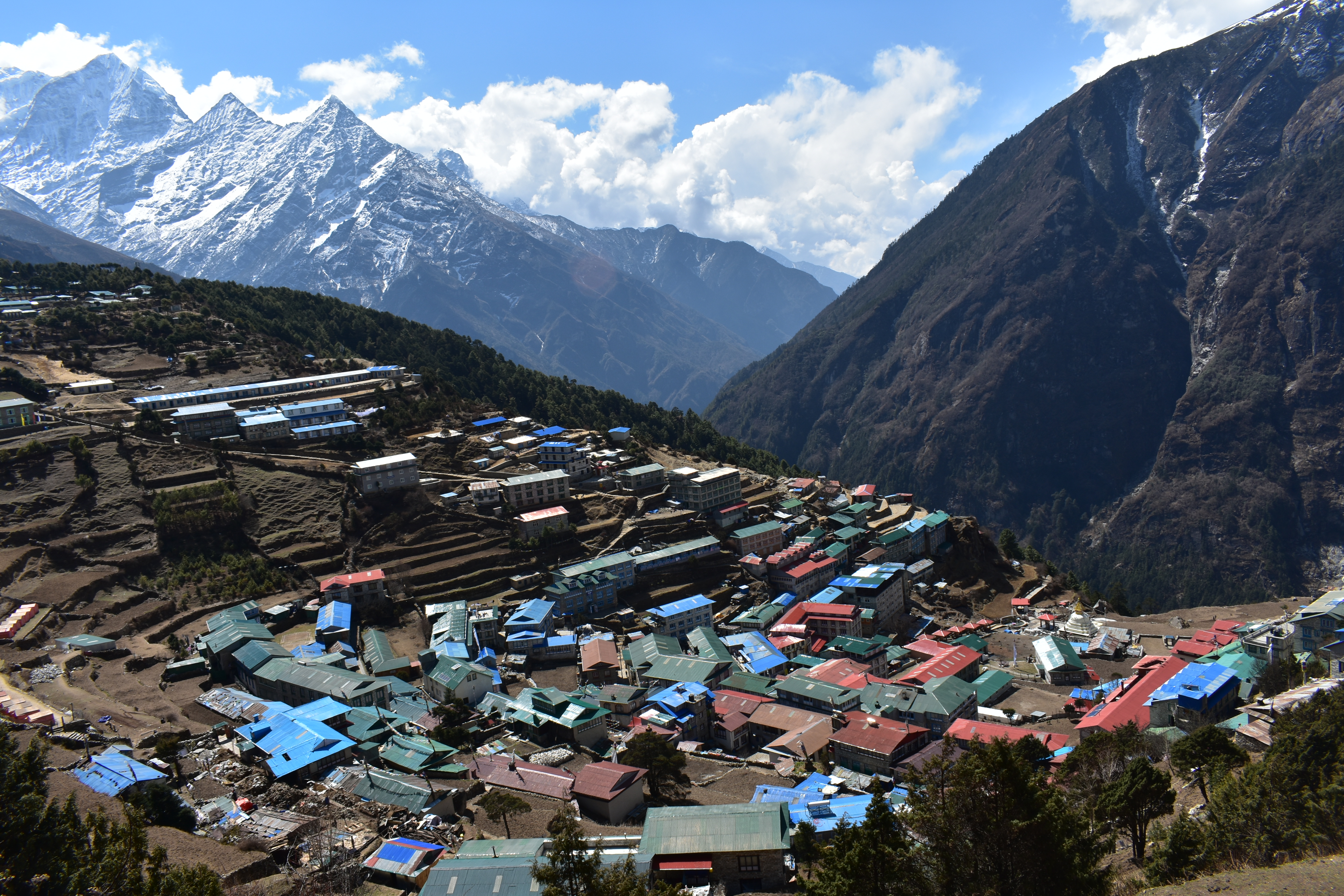A base camp filled with tents along the Everest Base Camp and Amadablam Base Camp treks in Nepal.