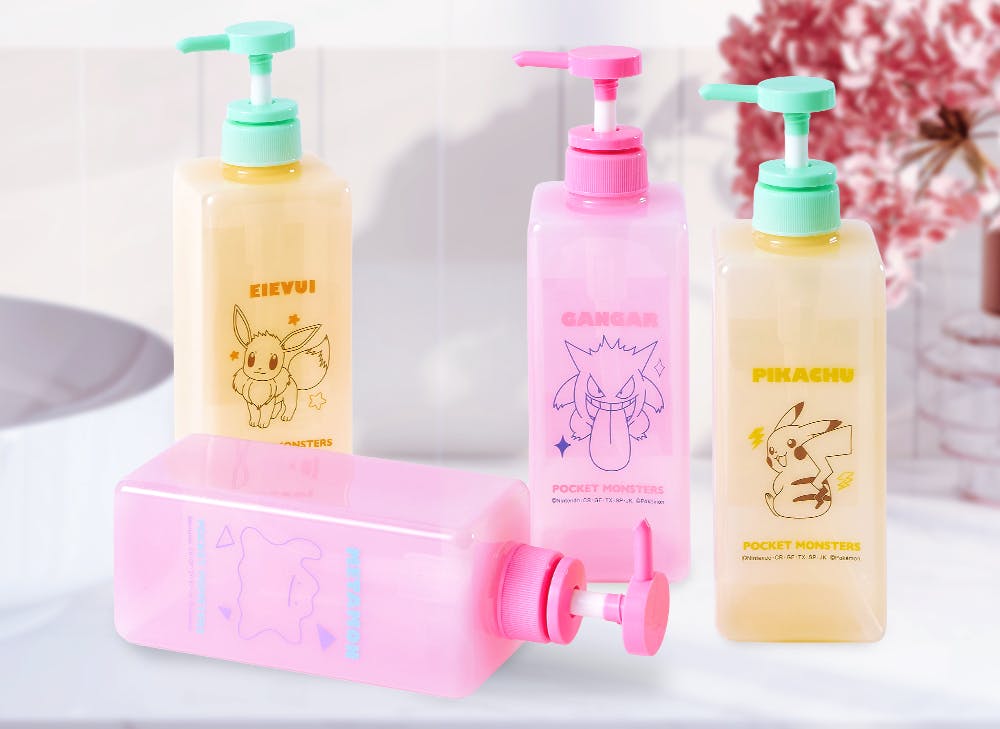 Four pokemon soap bottles stacked in a bathroom with Pokemon designs 
