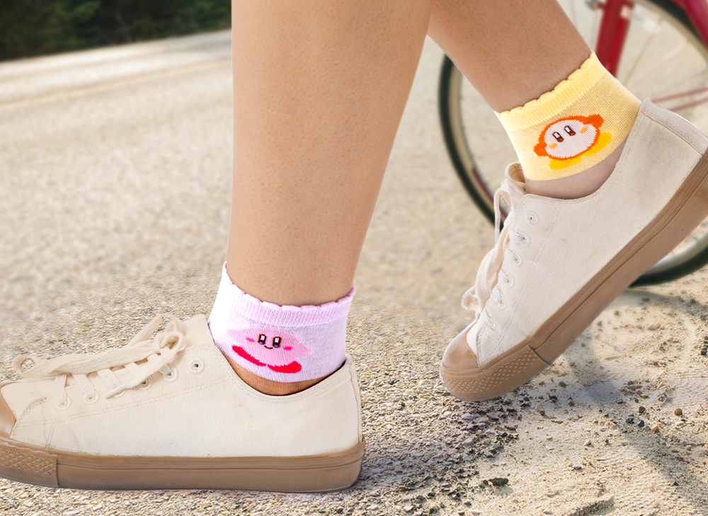 Person wearing kirby socks outside 