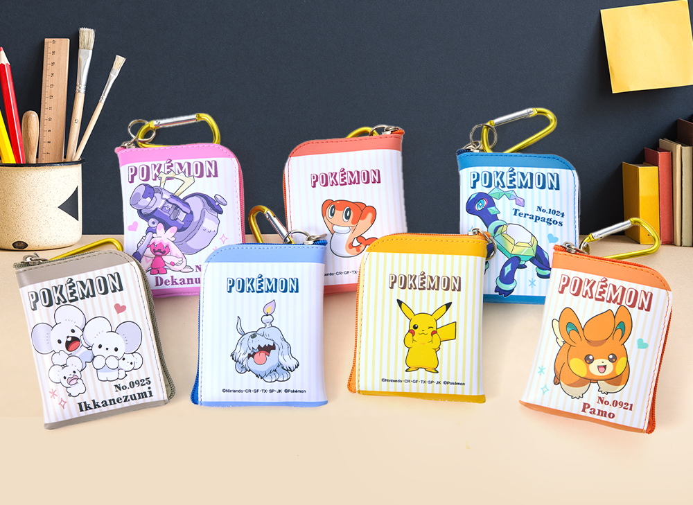 Pokemon Keychain Pouches sit on a kawaii desk setup.