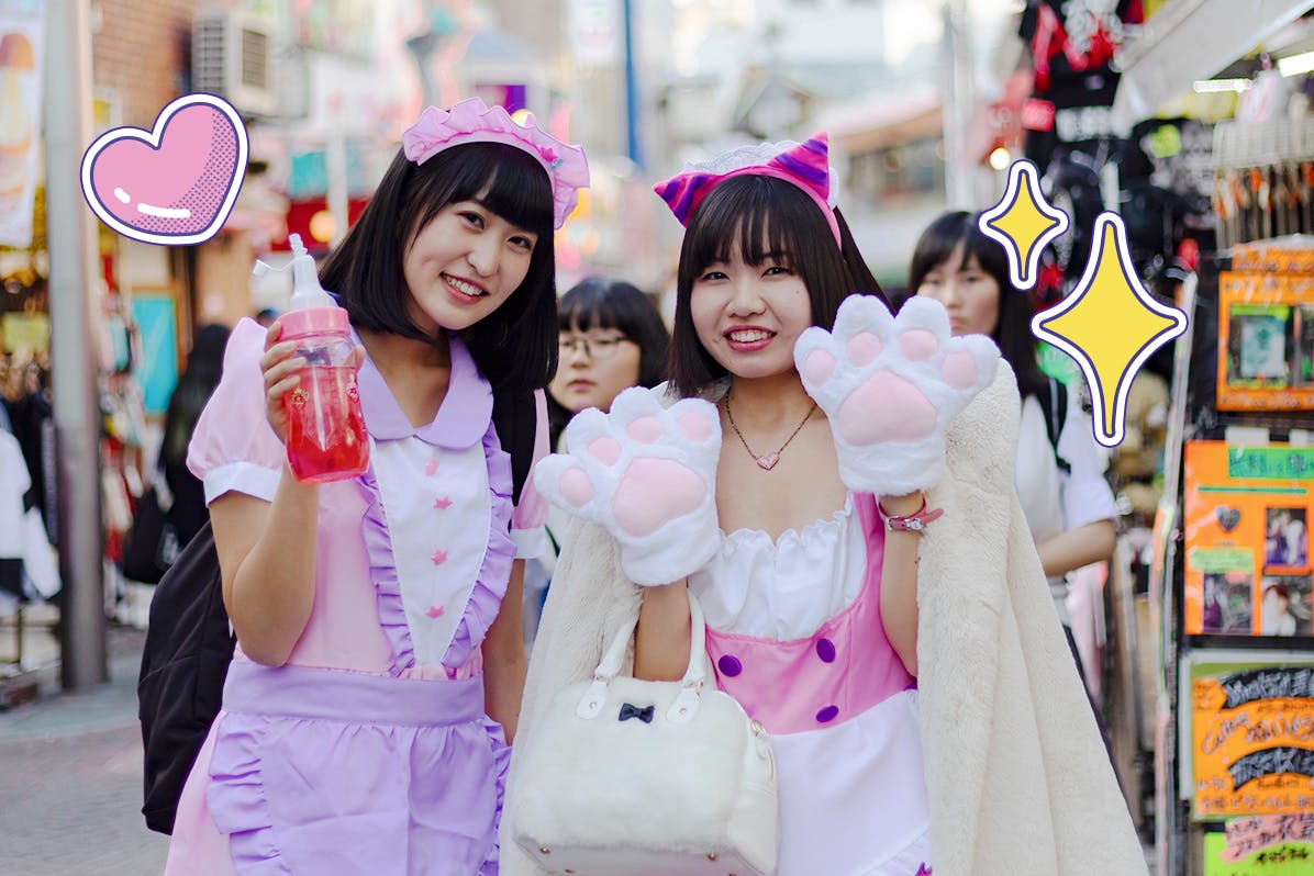 Two Japanese girls wearing cat costumes for Halloween walking around the streets of Harajuku and Shibuya