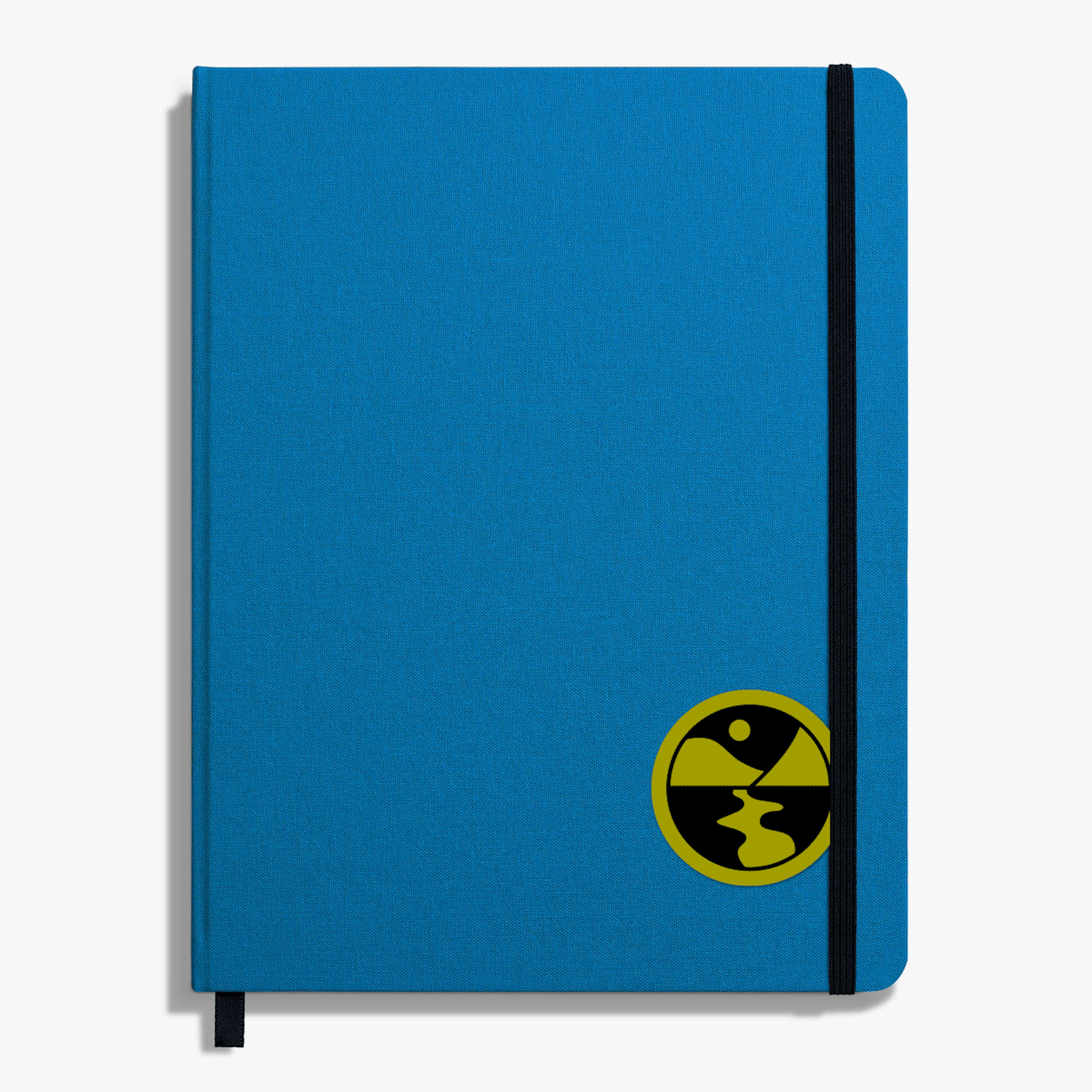 Animation shows a blue notebook with stickers of the Seeding Sovereignty logo appear on it.