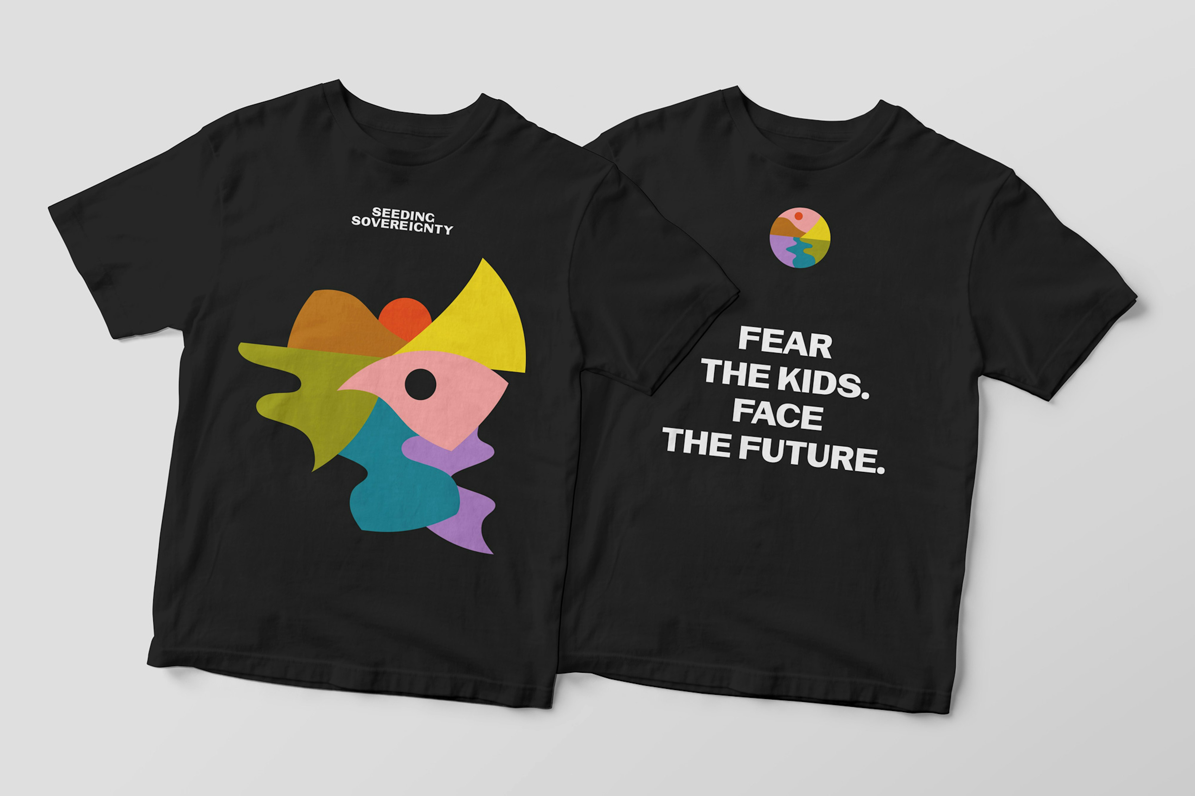 Image shows two shirts, one with a front view and one with a back view. One shows colorful abstract shapes with SEEDING SOVEREIGNTY in white text, and the other shows a small Seeding Sovereignty logo with FEAR THE KIDS. FACE THE FUTURE. in large white text. 