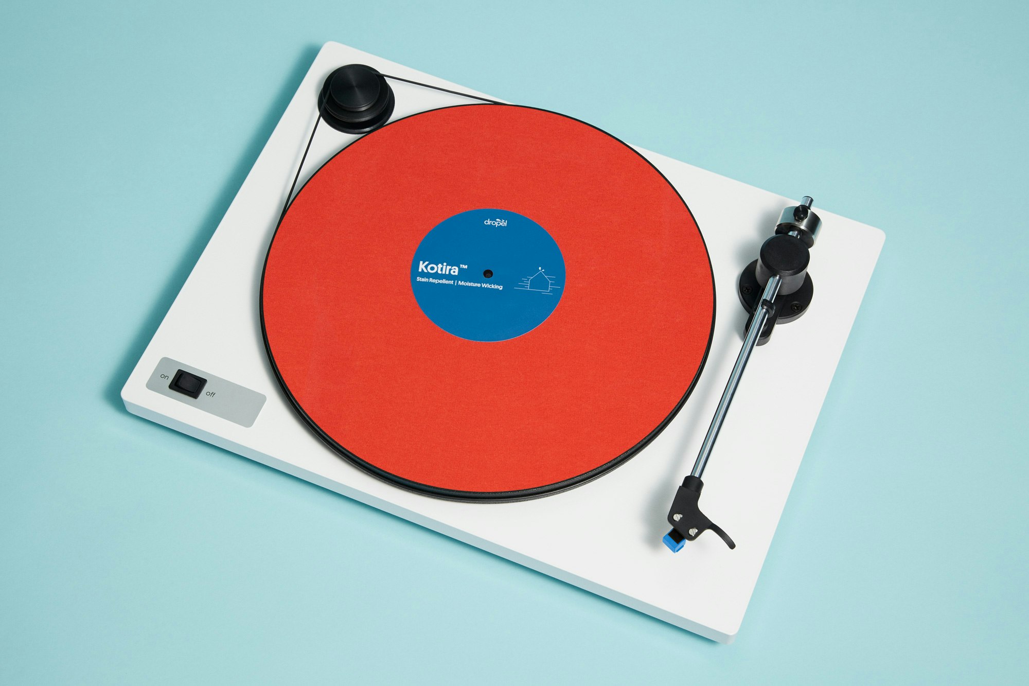 Image showing white record player with a custom red fabric record on top.
