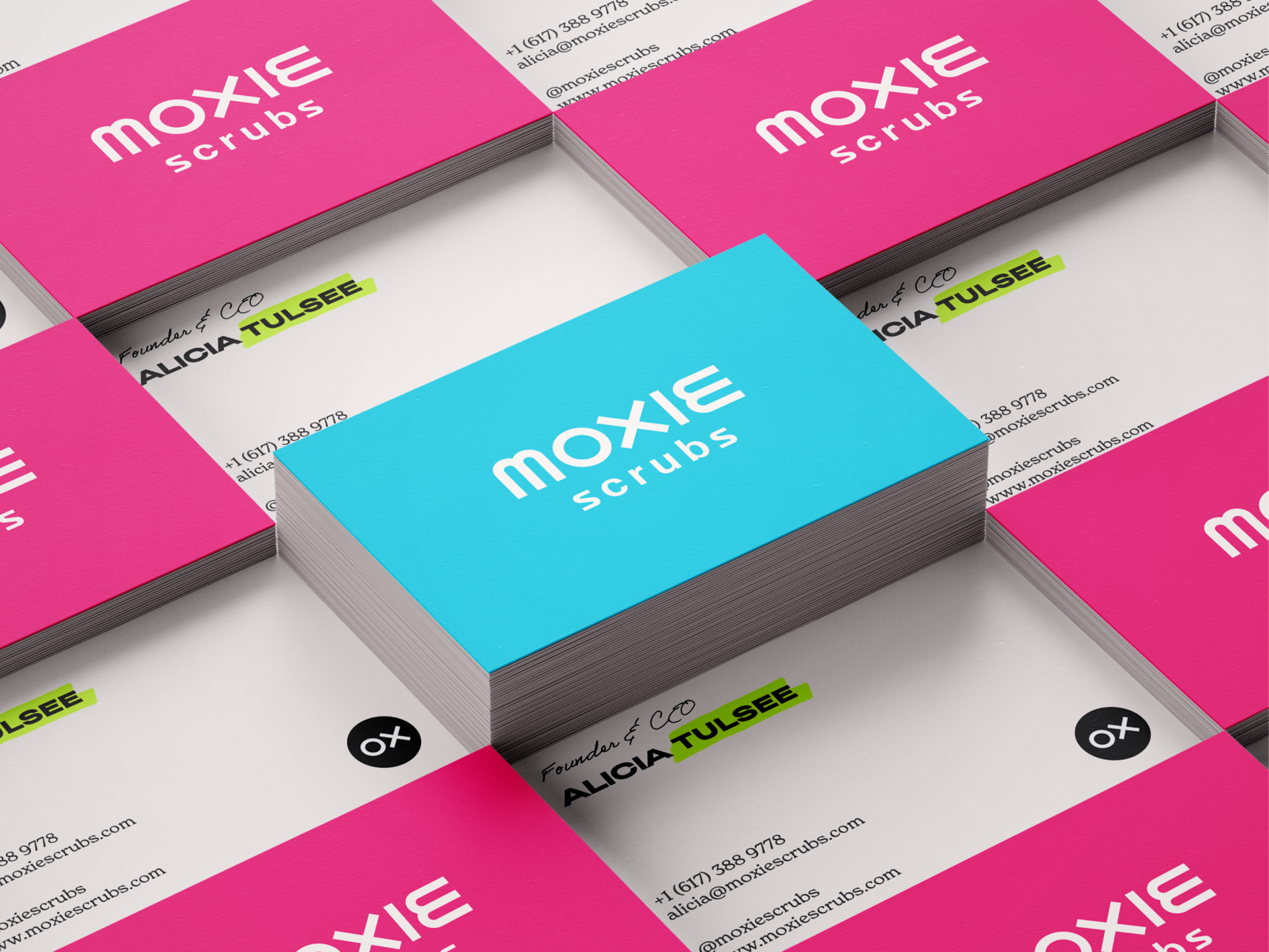Moxie Scrubs business cards with the front and back.