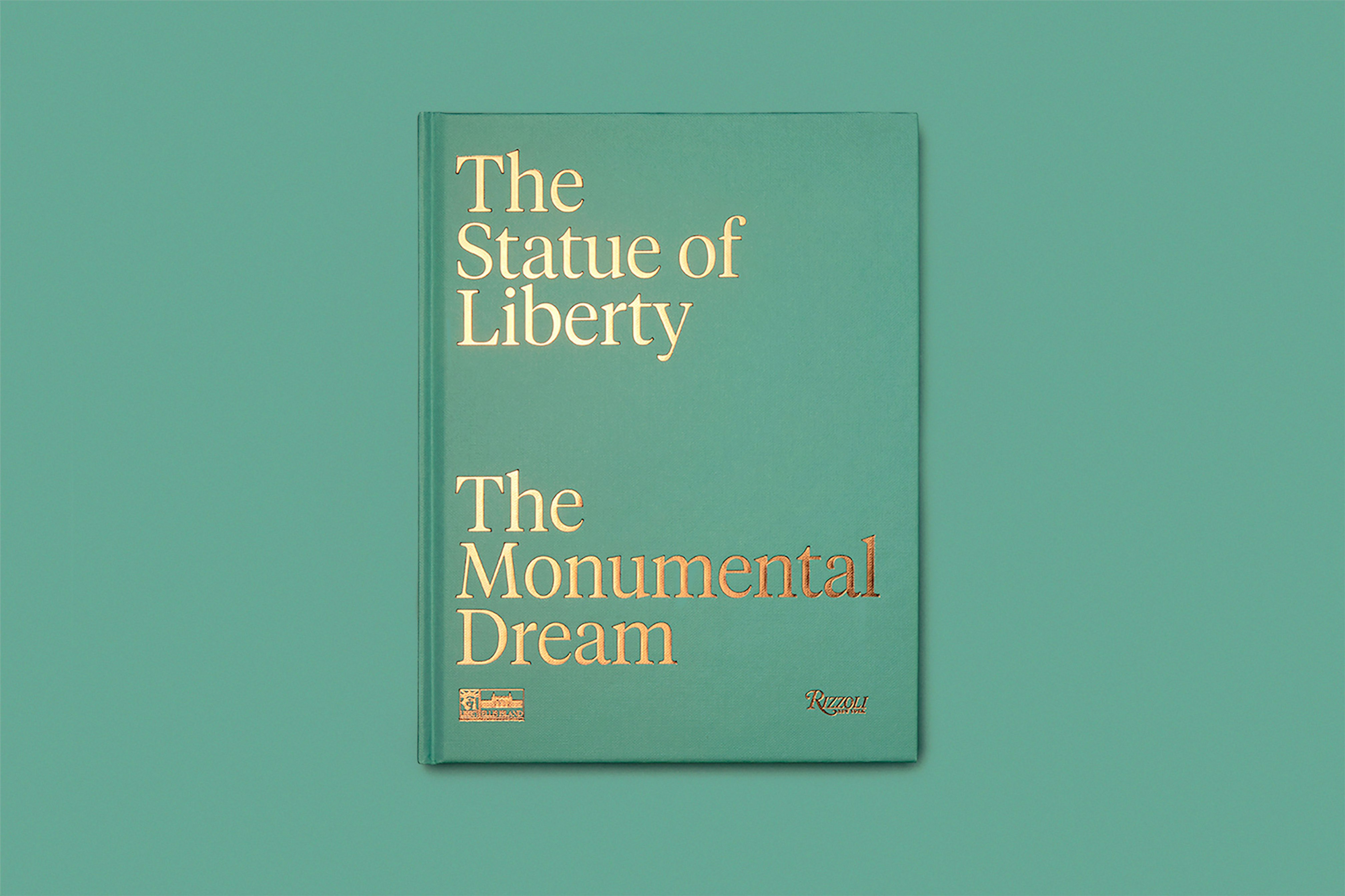 Image showing the Statue of Liberty book lying on a green seamless.