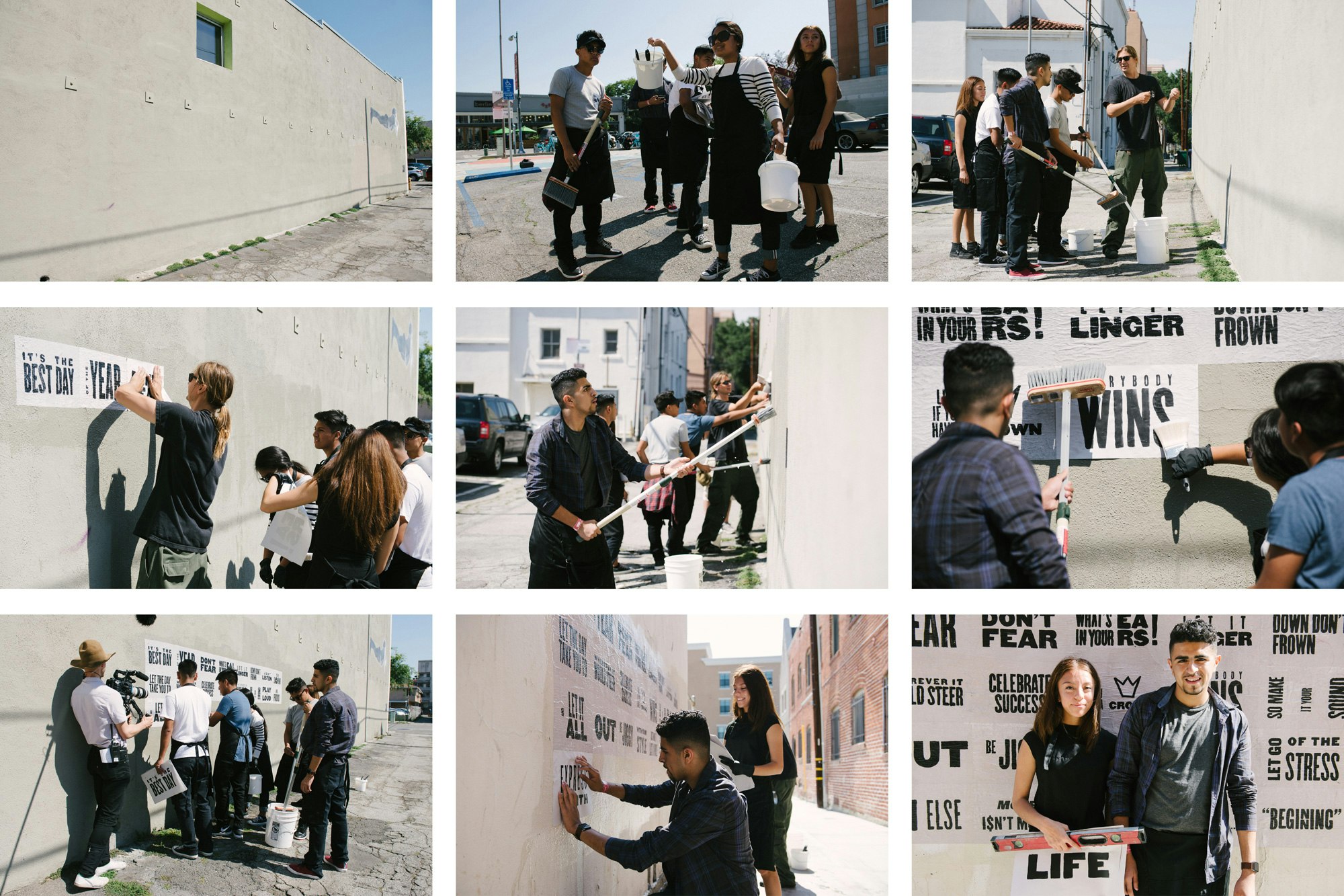 Image shows a grid of 9 images that depict a group of people wheatpasting signs (black text on white paper) onto an off-white wall. In some photos you can see a blue sky in the background.