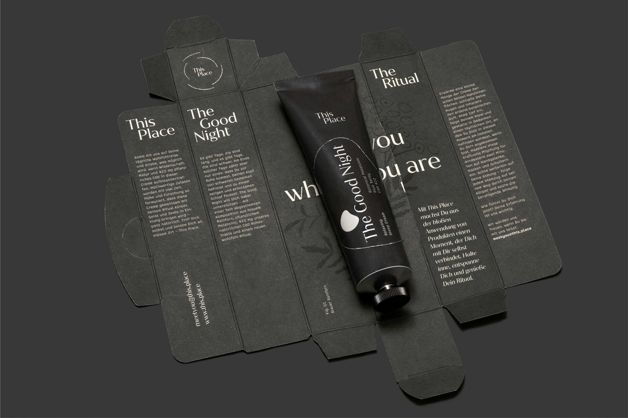 Image showing the charcoal tube lying on top of the open, flattened packaging.