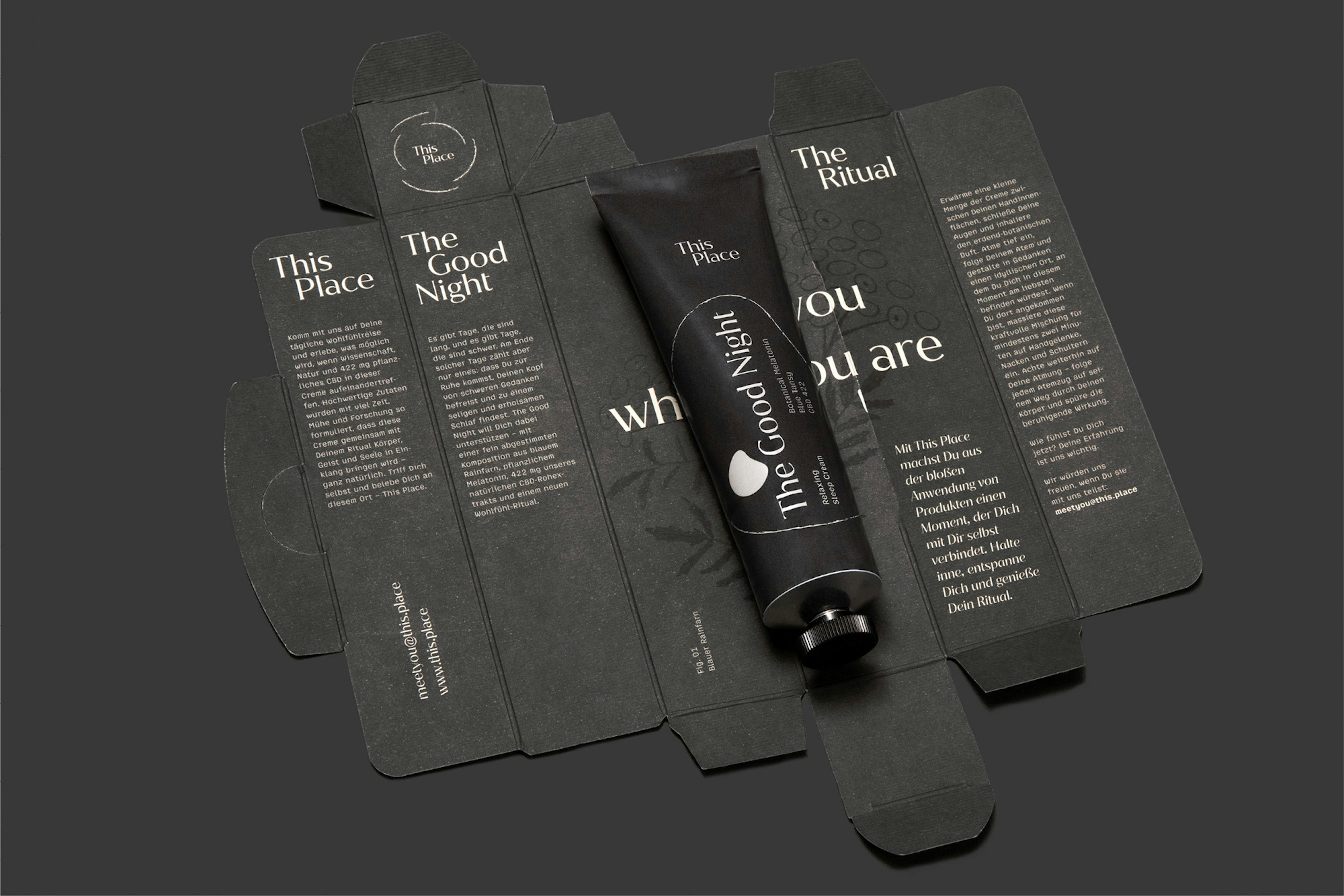Image showing the charcoal tube lying on top of the open, flattened packaging.