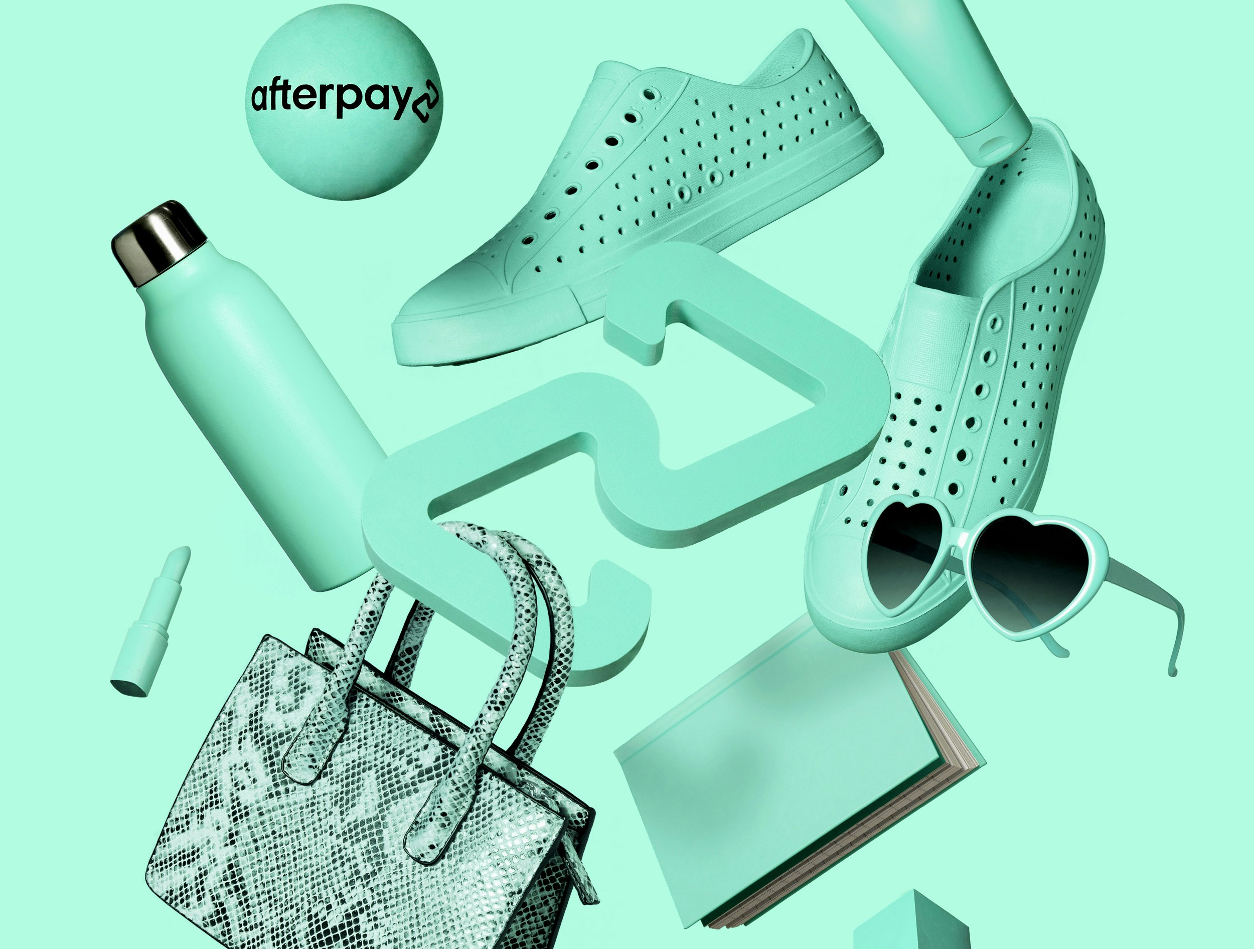 Image showing various products in the Bondi mint color floating in the air. There is a pair of shoes, a water bottle, a handbag, a notebook, a pair of sunglasses, lipstick, lotion. In the middle is a 3D model of the Afterpay logo.