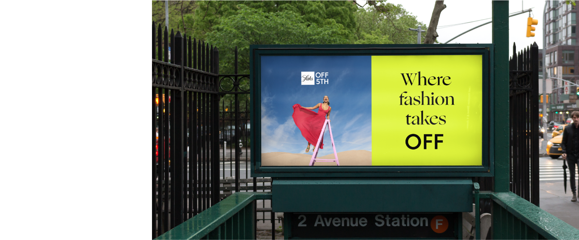 Subway station ad with the photo on the left and the tagline "Where fashion takes OFF" in black on yellow background.