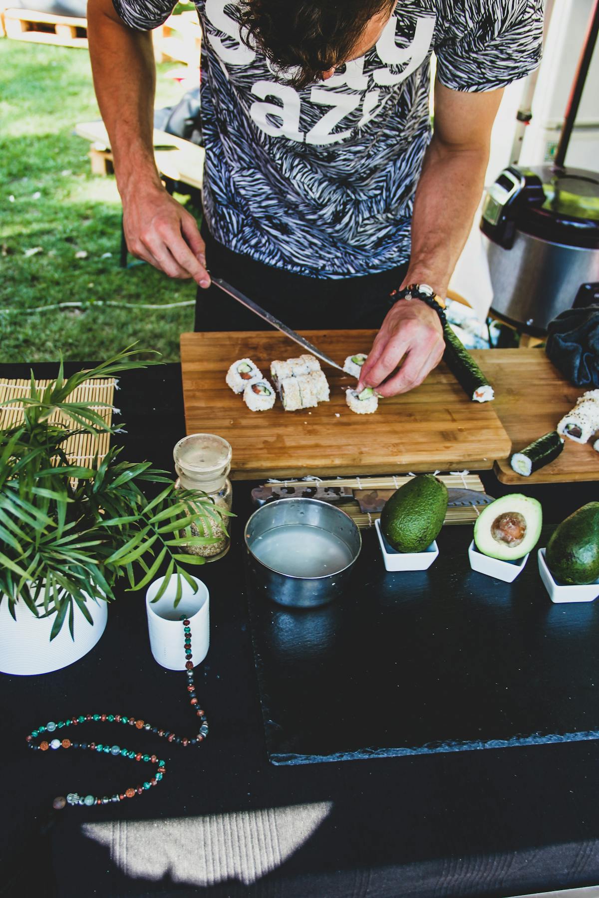 A man cooks maki - Photo by Viktor Theo on Unsplash