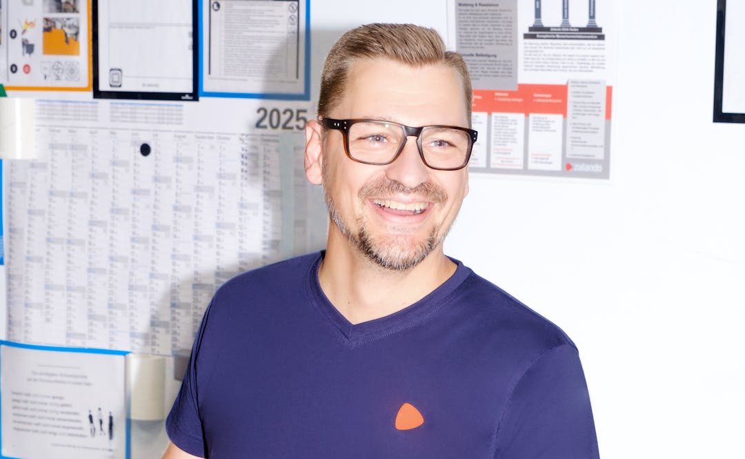 Department lead at Zalando Logistics at his desk. 
