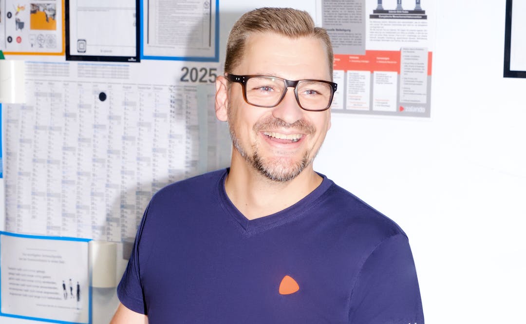 Department lead at Zalando Logistics at his desk.
