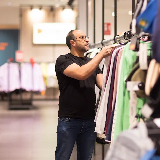 Outlet by Zalando Store Manager is working on the floor.