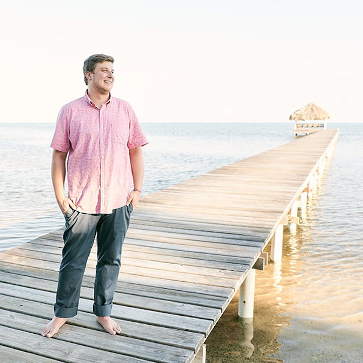 Devin Popper standing on a dock