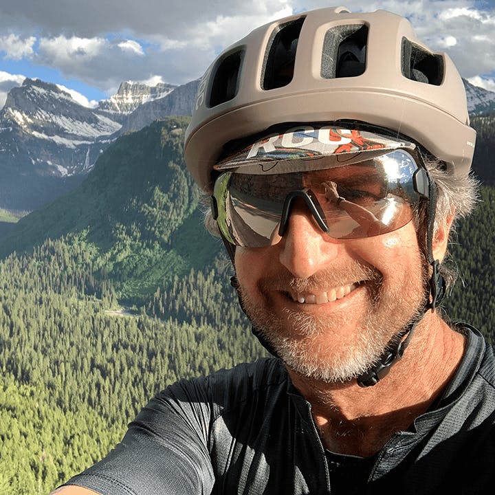 Pete cycling the Going-to-the-Sun Road in Glacier National Park