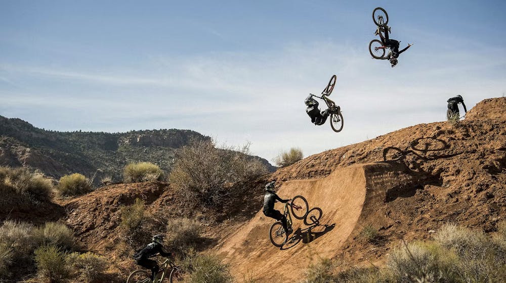 Bike riders performing aerial flips