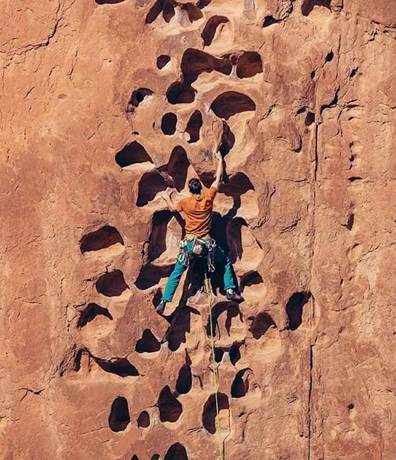 Man climbing a rock wall