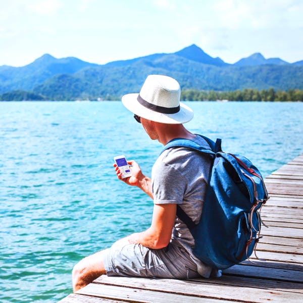 Man looking at the Faye app on a dock 1.png