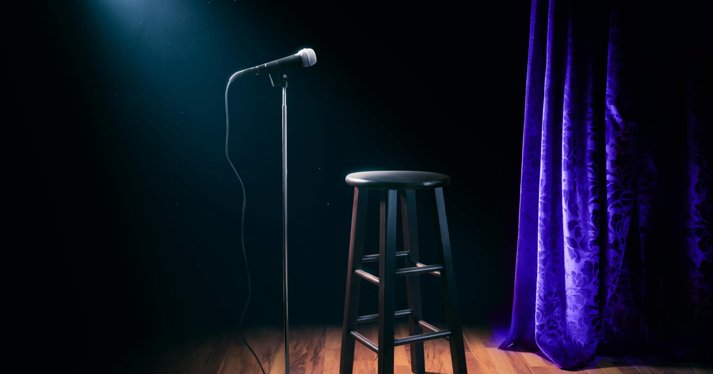 Mic, stool and curtain for a comedy set