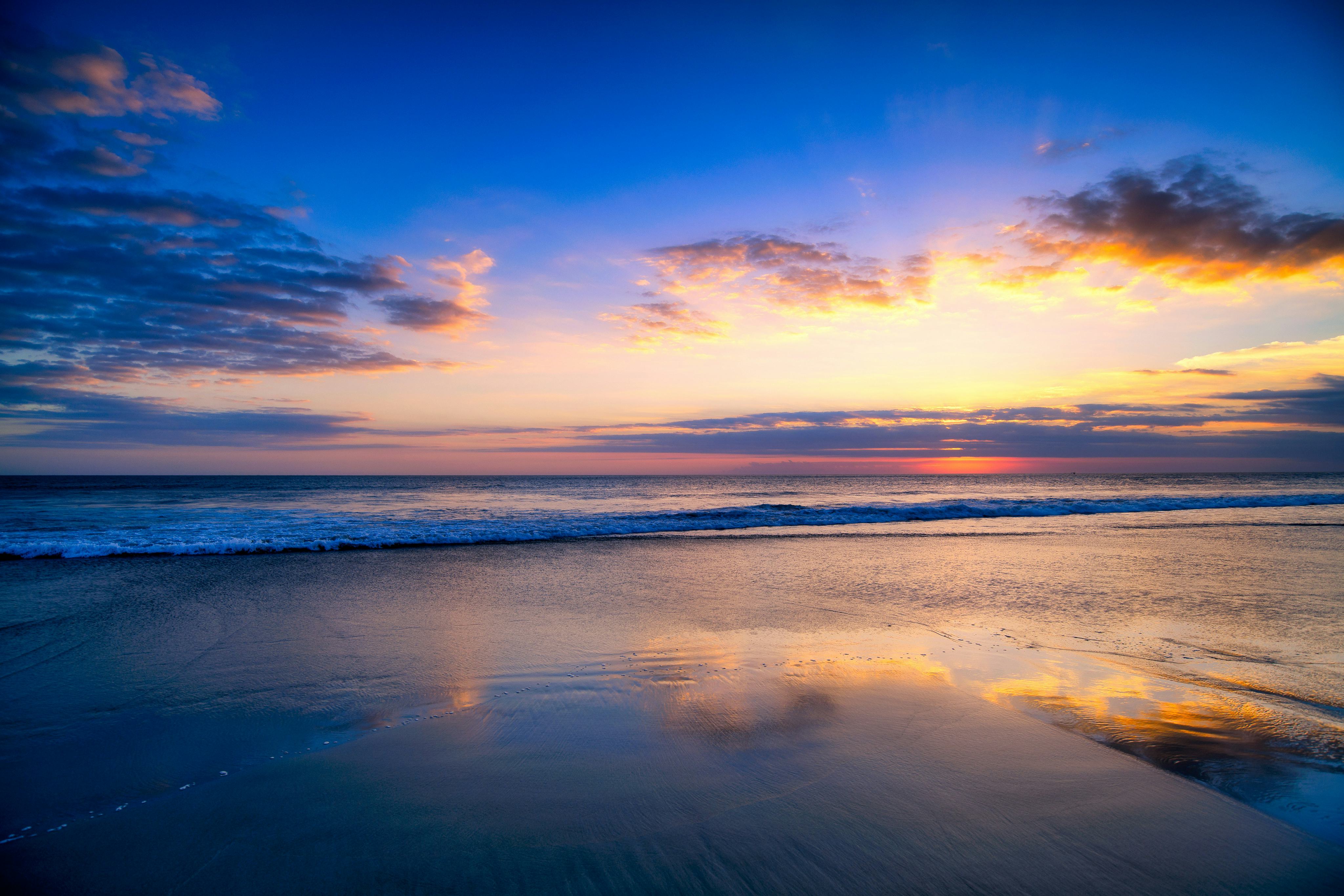 Sunset at Seminyak beach in Bali, Indonesia