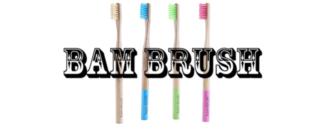 Four brightly colored bamboo toothbrushes and the text BAM BRUSH