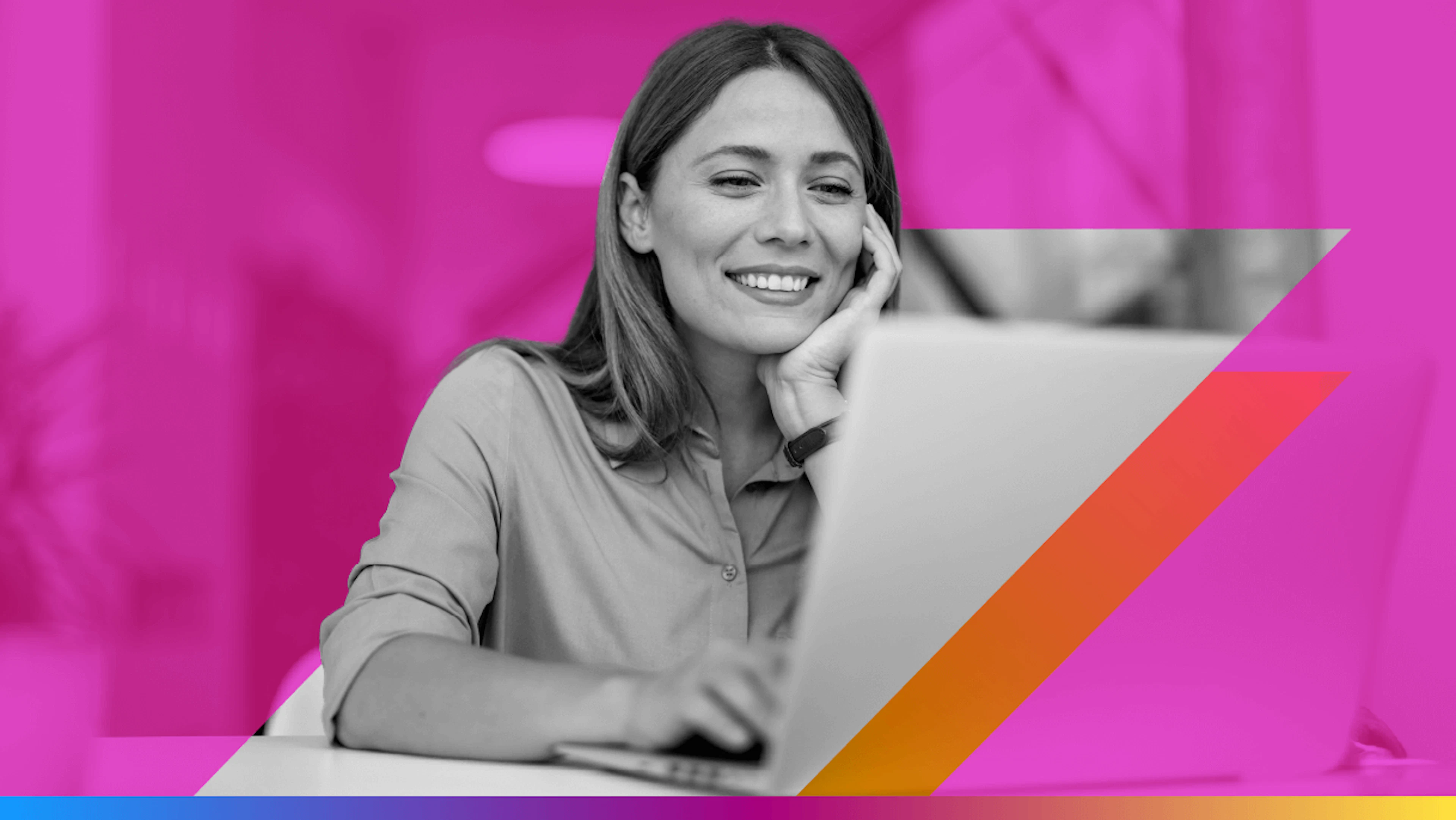 person sitting smiling in front of a laptop - featured image for Ai favors consolidation for publishers article