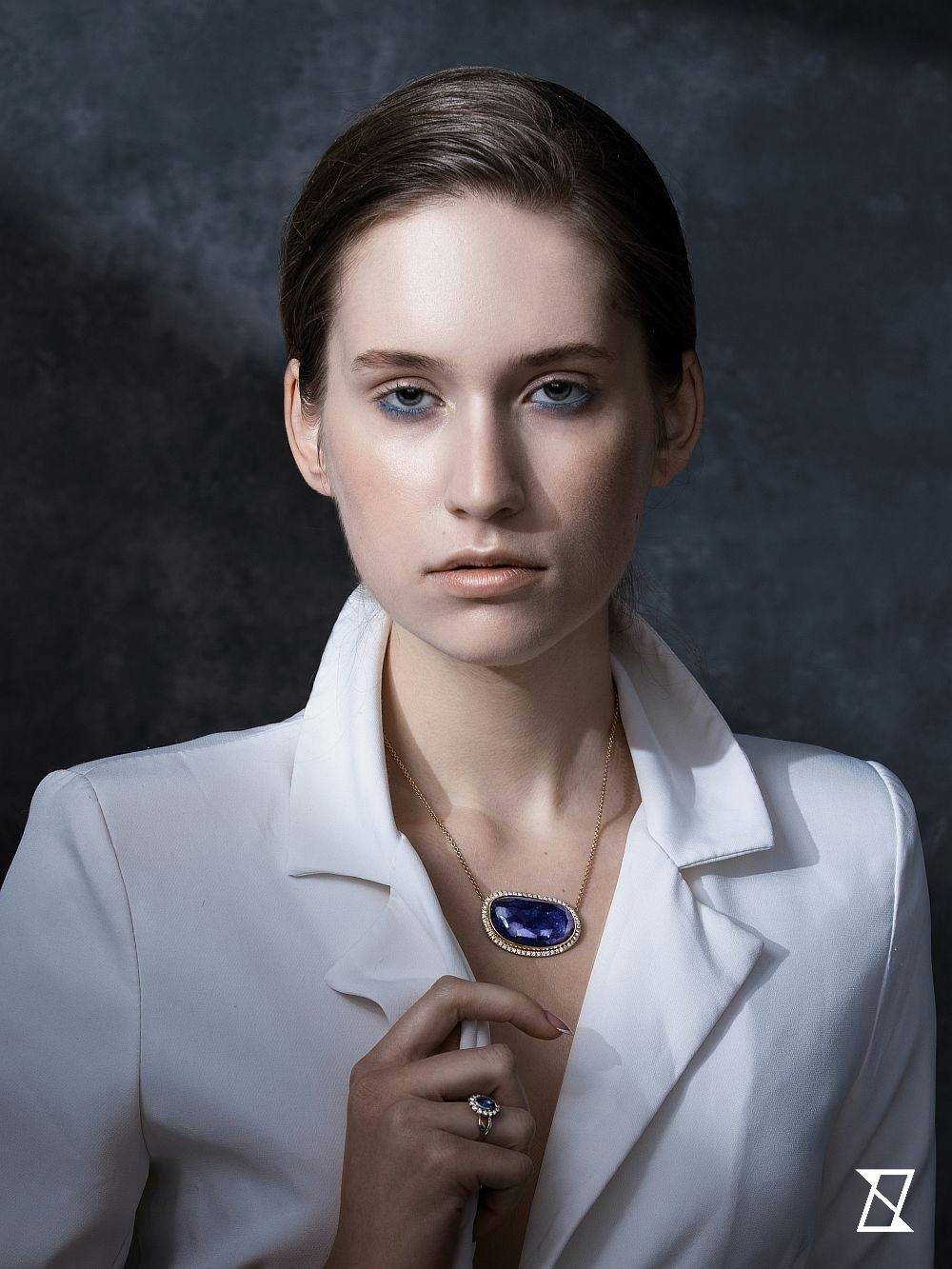 Baroque tanzanite necklace on a model. 