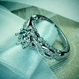 Baroque ring with a perfect diamond