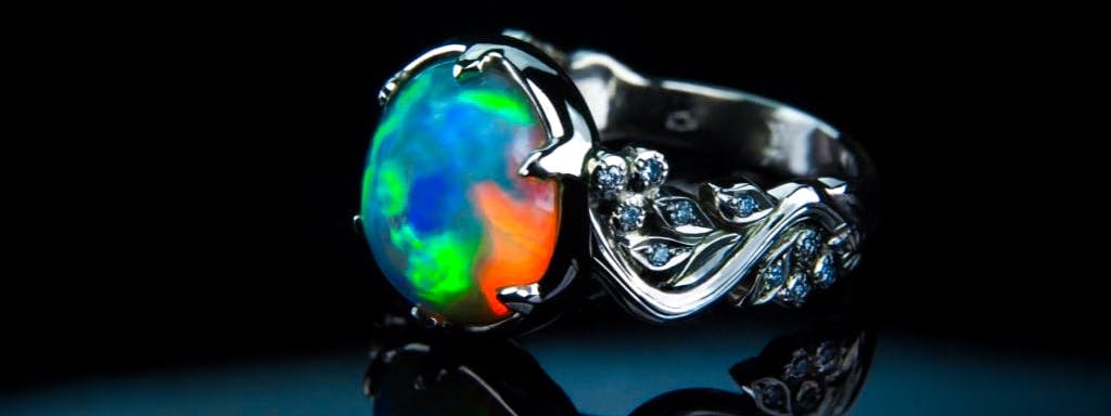 Ring with opal and diamonds