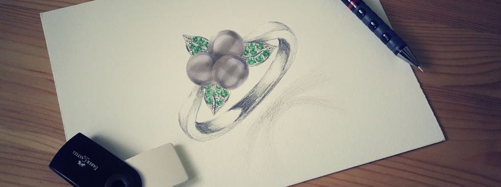 Ring with blueberry pearls and tsavorite.