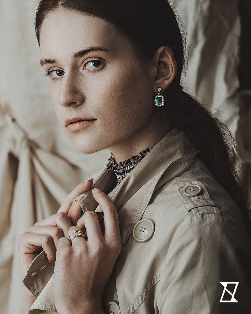 Earrings with emeralds and diamonds.