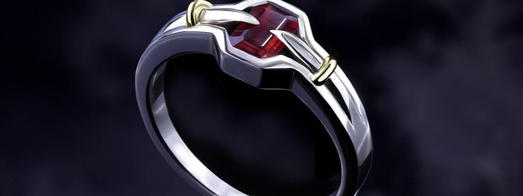 Alpha male ring in two-tone gold featuring Mozambique octagon ruby.