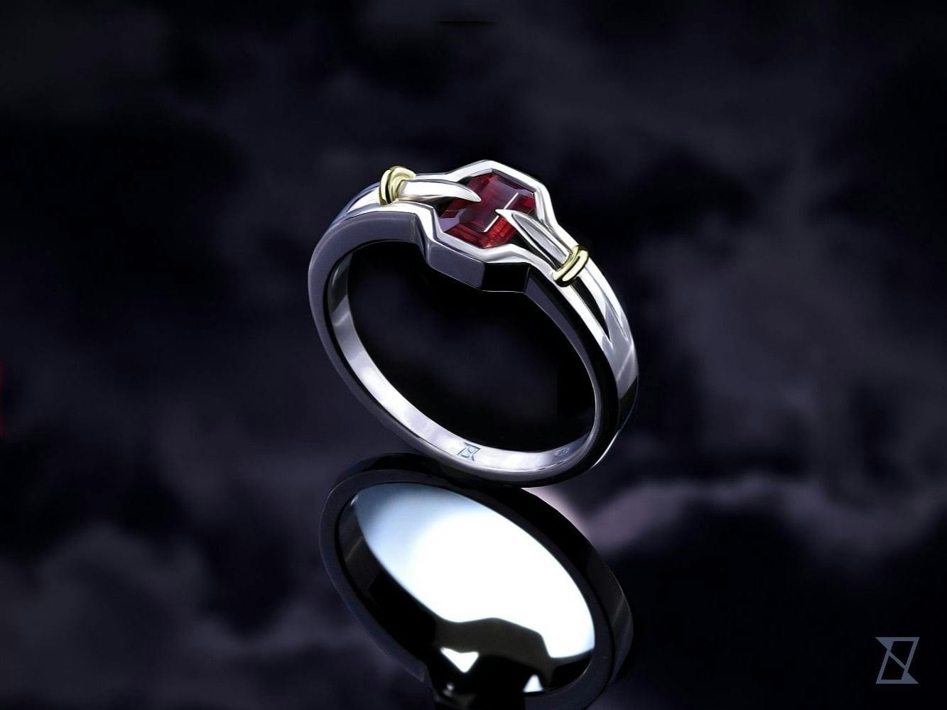 Alpha male ring with Mozambique ruby and two daggers.